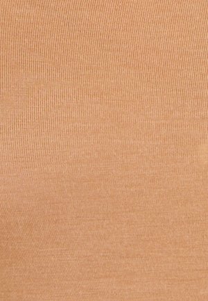 Tessuto beige a coste con una superficie liscia, caratterizzato da linee verticali. Il materiale appare elastico e leggero.