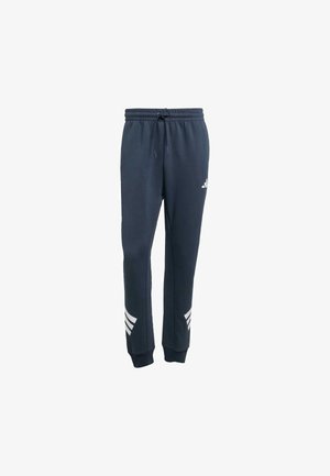 Navy blue sweatpants with elastic waistband and drawstring. Features white diagonal stripes at the lower legs. Soft texture and tapered cuffs.