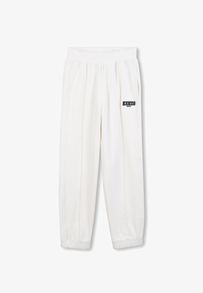 Pantalon de survêtement blanc avec une taille élastique et des poches latérales, avec un logo noir "KENZO PARIS" sur le côté gauche.