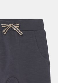 Hust & Claire GEORGEY SOLID UNISEX - Calças de fato de treino - midnight