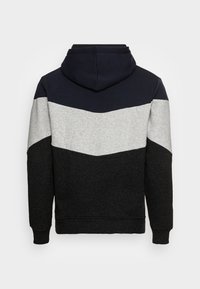 Hoodie met een chevronpatroon in marineblauw, grijs en zwart. Gemaakt van zachte stof met een standaard pasvorm en geribde manchetten.