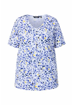 Hvid bluse med korte ærmer med blå, sort og gul blomsterprint og V-udskæring med små folder under kraven.