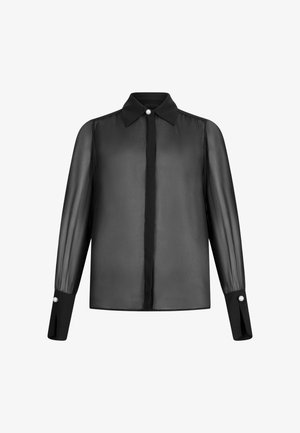 Blouse noire transparente avec un col classique, un devant boutonné et des manches longues, présentant des poignets noirs accentués de boutons en perles.