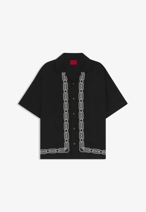 Black short-sleeve button-up shirt featuring white embroidered geometric patterns along the front, with a classic collar and relaxed fit.