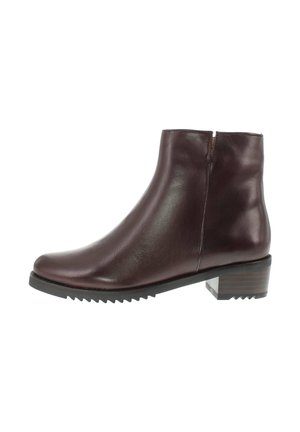 Dark brown leather ankle boot with low block heel and ridged sole, side zipper for closure.