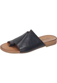 Black leather slide sandals with an open toe, a wide strap design, and a flat tan sole. Subtle texture on the leather adds detail.