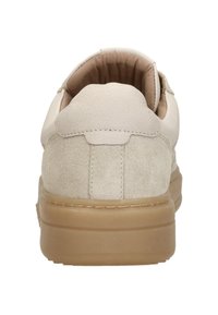 Beige suede and leather sneaker viewed from the back, with padded collar and thick light brown rubber sole.