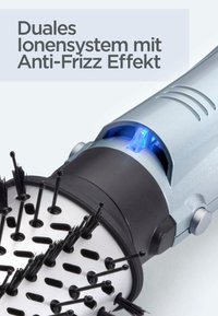 Hair styling tool with round brush head and visible blue light, labeled with German text about dual ion system and anti-frizz effect.