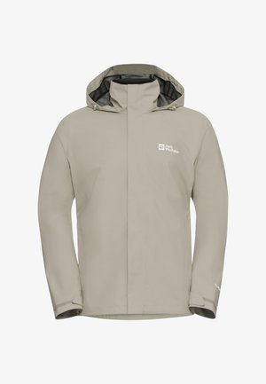 Beige wasserdichte Jacke mit schwarz gefütterter Kapuze, Frontreißverschluss und verstellbaren Bündchen. Mit dem Jack Wolfskin-Logo auf der linken Seite.