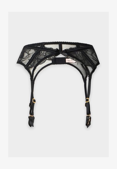 Jarretière en dentelle noire avec bretelles réglables et accessoires dorés, ornée de motifs floraux en dentelle et d’un petit nœud central.