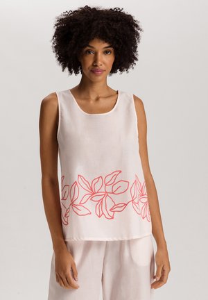 Haut sans manches rose en tissu léger, orné d'un design de broderie florale en corail le long de l'ourlet et d'un col rond.
