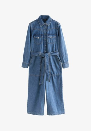 Ogrodniczka z długim rękawem, kołnierzem, dwoma kieszeniami na piersiach, pasem w talii i szerokimi nogawkami. Jasnoniebieska z kontrastującym przeszyciem.