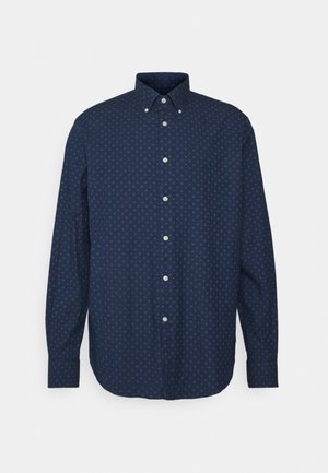 Dunkelblaues, langärmliges Hemd mit kleinem Kreuzmuster, Button-down-Kragen und weißen Knöpfen vorne und an den Manschetten.