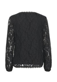 Top lungo a maniche in pizzo nero con motivi floreali e orlo ondulato. Tessuto trasparente con scollatura rotonda e maniche aderenti.