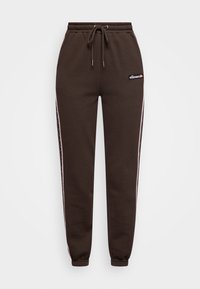 Pantaloni della tuta marroni con cintura elastica, cordoncino, accenti rosa laterali e patch con logo sulla parte anteriore. Realizzati in morbido tessuto.