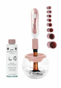 Sätt för rengöring av sminkborstar med en klar glasbowl, rosa bas och rosa vädjan på en elektrisk borstrengörare. Inkluderar sex borsttillbehör.