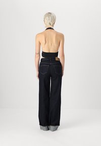 Vero Moda VMTESSA WIDE FOLD UP - Široke nogavice - dark blue denim