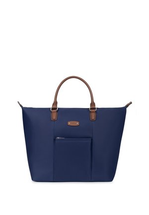 Sac cabas bleu marine avec poignées en cuir marron et petite poche zippée à l'avant, forme rectangulaire, texture lisse, design minimaliste.