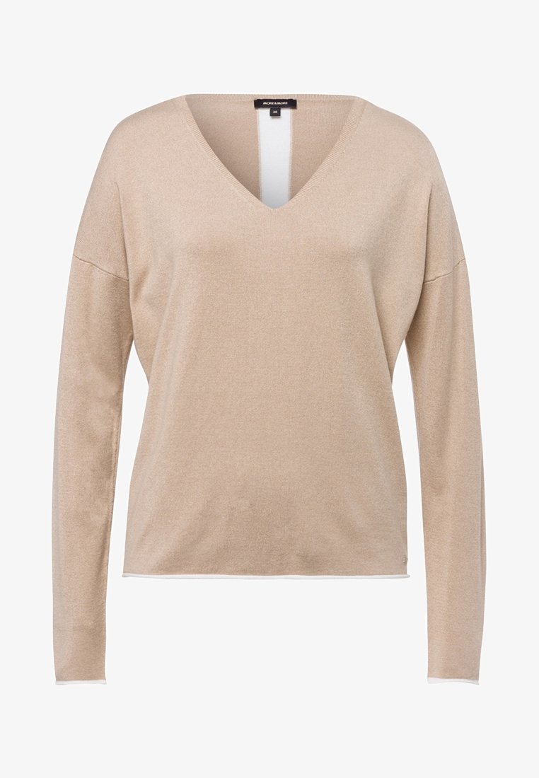 Pull en maille beige à manches longues et col en V, coupe décontractée avec poignets côtelés discrets.