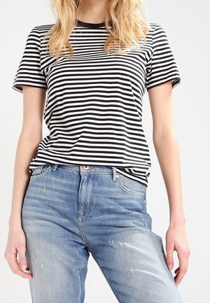Black and white striped t-shirt with short sleeves, paired with light blue distressed jeans. The fabric appears soft, with a fitted design.