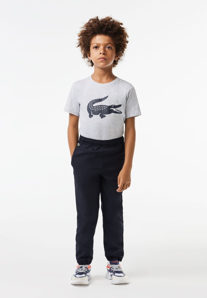 Lacoste - SPORTS JOGGERS - Träningsbyxor - abysm, Förstora