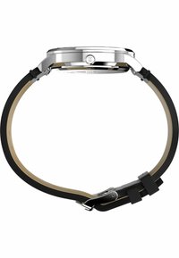 Black silicone strap watch with stainless steel case, round face, and a silver crown. Accented with a smooth inner leather lining.