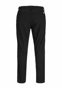 Black pants made of a smooth fabric, featuring an elastic waistband and two back pockets with a minimalist design.