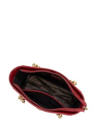 Red leather handbag with a structured shape, gold hardware accents, and a black satin-lined interior featuring organizational pockets.