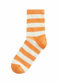 Calcetín único de rayas horizontales naranjas y blancas con secciones reforzadas en la punta y el talón.
