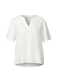 Blusa bianca a maniche corte con scollatura a V, realizzata in tessuto liscio, con maniche arrotolate e orlo leggermente arrotondato.