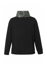 Sweat-shirt noir avec col imprimé léopard, manches longues et ourlet côtelé. Confectionné dans un tissu doux à la texture lisse.