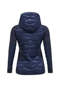 Giacca puffer di un blu navy scuro con un motivo trapuntato, cappuccio aderente e maniche lisce in contrasto. Tessuto leggero e isolato.