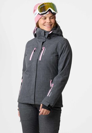 Grå skijakke med pink lynlåse og detaljer. Har hætte og flere lynlåslommer. Bæres med en pink hue og skibriller.