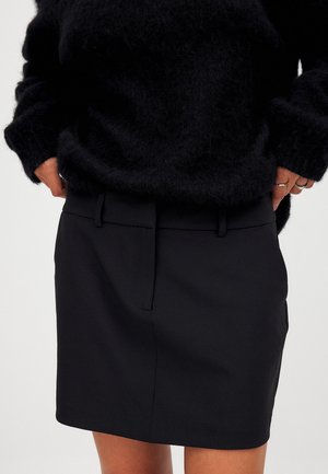 Falda acampanada - black
