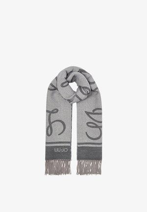 Écharpe grise tissée avec motif d'écriture sombre, bords frangés et logo "LIU JO" près du bas sur un fond blanc uni.