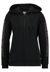 Sweat à capuche noir zippé en tissu doux, avec une poche kangourou, une capuche avec cordons de serrage et le texte "VANS OFF THE WALL" en couleur contrastante le long de la manche.