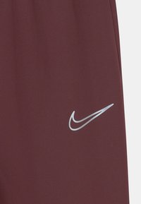 Nike Performance ACADEMY WINTERIZED UNISEX - Jogginghose - burgundy crush