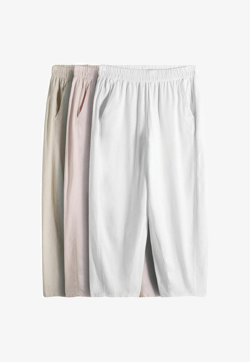 Three pairs of relaxed-fit pants with elastic waistbands and side pockets, in white, light pink, and beige colors, arranged overlapping.