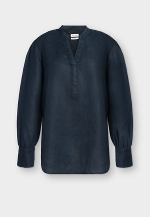 Blouse bleu marine à manches longues avec col mandarin, fente en V, poignets froncés et coupe ample, présentée sur un fond uni.