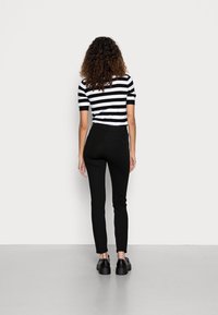 Guess GRETA SKINNY PANTS - Calças - jet black