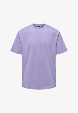 Light purple cotton t-shirt, short sleeves, round neck, oversized fit, smooth texture, no visible patterns or graphics. Label at the hem.