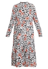 Klänning med blommor och djurmönster, långa ärmar, knäppning i halsen, vit bakgrund med svarta fläckar och rosa blommor; volangkant.