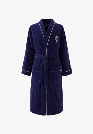 Accappatoio in spugna blu navy con piping bianco, due tasche frontali, cintura in vita e logo ricamato a forma di diamante sul petto sinistro.