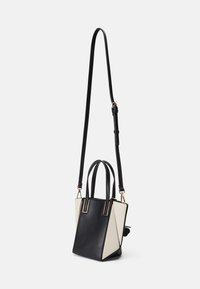 ALDO SMALLPRISMATOTE - Kabelka - black/white