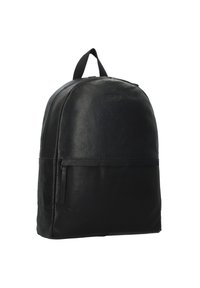 Black leather backpack with a rounded design, a front zipper pocket, and a top handle for carrying. Textured surface with subtle branding.