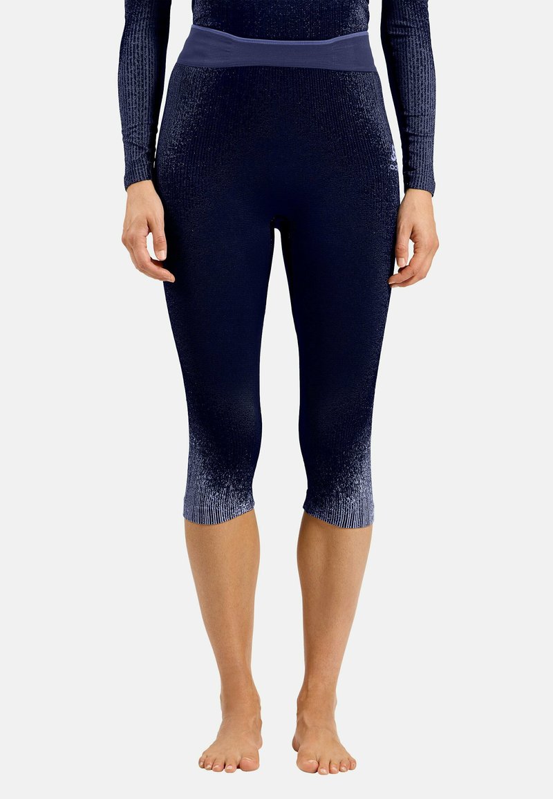 Marineblaue Sportleggings aus strukturiertem Stoff mit einem breiten Bund, präsentiert ein Farbverlaufdesign, das an dem Saum in ein heller Blau übergeht.