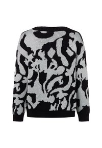 Übergroßer schwarzer Pullover mit weißem abstraktem Muster, geripptem Ausschnitt und Bündchen, weiche Strickstruktur, sichtbare Nähte an Schultern und Seiten.