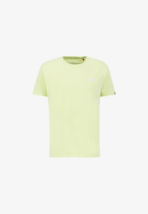 T-shirt à manches courtes en coton vert clair, avec un col rond et un petit logo blanc sur la poitrine. Texture lisse, design minimaliste.