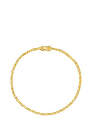 Gold tennis bracelet with closely set square-cut yellow gemstones and a rectangular clasp on a white background.