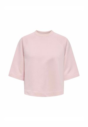 Lys pink cropped sweatshirt med korte raglanærmer og rund hals, præsenteret mod en hvid baggrund.